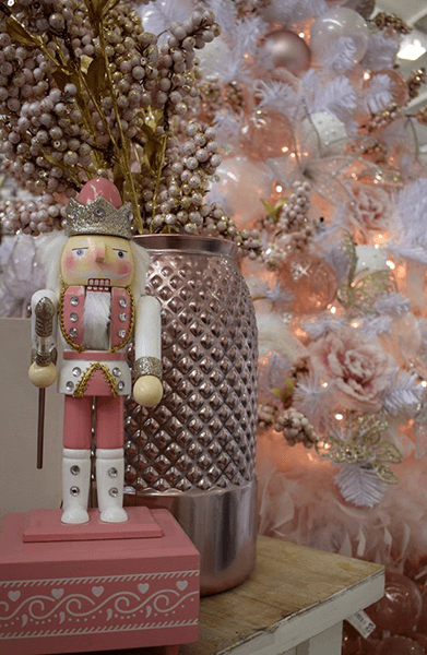 pink nutcracker and pink christmas theme tree with decorations