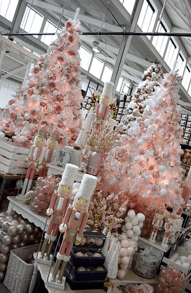 pink christmas theme display with trees and decorations