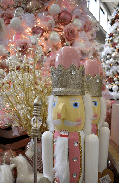 two pink nutcrackers in pink themed display