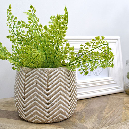 small light green adiantum faux fern in chevron pot with white photo frame