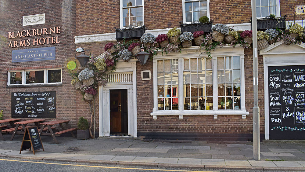 blackburne arms - wicker baskets and faux floral installation for pub over doorway