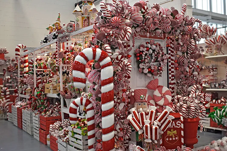 red and white candy cane themed christmas decorations and garlands