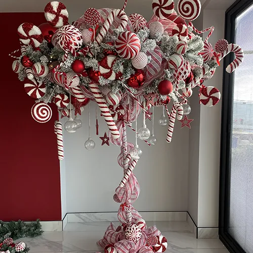 umbrella christmas tree decorated with candy canes and lollipops