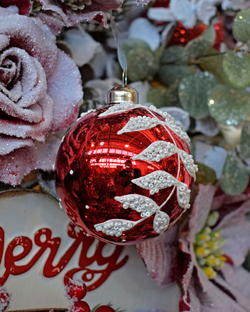 frosted red artificial rose, red and white leaf pattern bauble