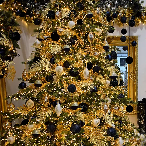 dusk theme with gold and blue christmas tree decorations