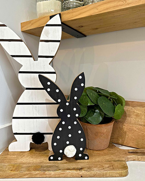 black and white easter decor striped and polka dot bunny silhouette ornaments with faux plant