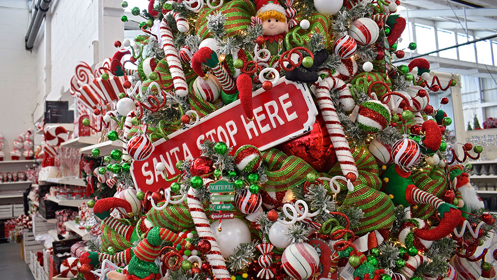 elf christmas tree decorations with santa stop here sign