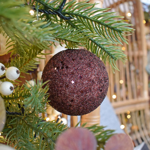 mocha burgundy beaded bauble and neutral christmas decorations on green tree