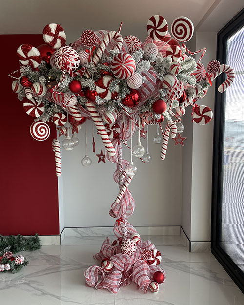 residential christmas decorating service - candy cane red and white umbrella christmas tree