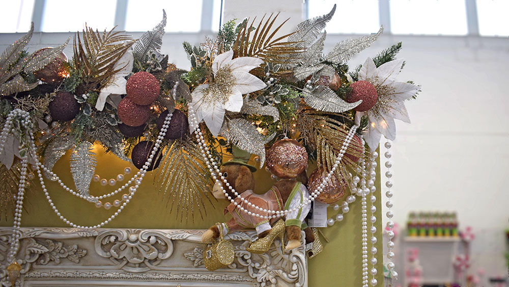 regal monkey christmas decoration with metallic florals, foliage and pearl garlands