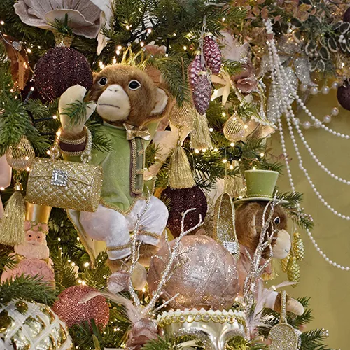 regal monkey christmas decorations in pistachio, pink and gold