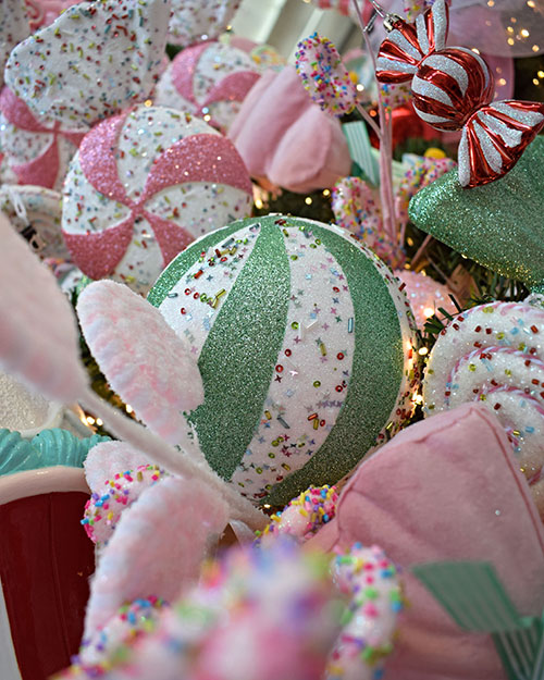 pink and white lollipop decorations, sparkly light green and white baubles